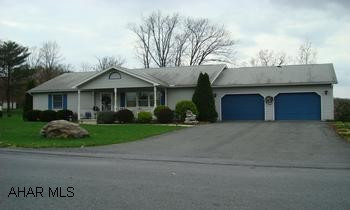 Four Bedroom, 2.75 bath ranch home. Wonderful 4 bedroom ranch with two car attached garage on a beautifully landscaped lot in Lakewood manor.  Lots of living space in with the large living rooms upstairs and down, eat-in kitchen, and perfect for enertaining with the large enclosed sunroom and open and covered decks out back.  With rising energy costs this home offers effeciency at its best with a natural gas heat pump and updated windows.  A great home for any family.  Call Chris to make your appointment today at 814-285-2533