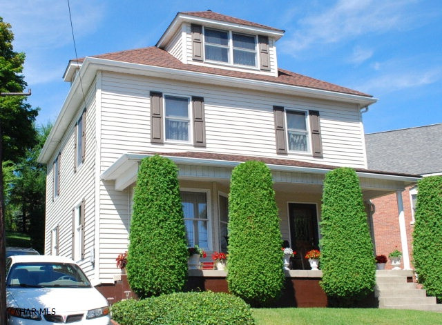 Charming and meticulously maintained older home with hardwood floors throughout.  Huge living room with 9' swirled ceiling and pretty, decorative front door. Large eat-in kitchen with separate pantry.  Big dining room currently used as den. Bedrooms have very large closets.  Heated third floor has full bath, bedroom, and storage.