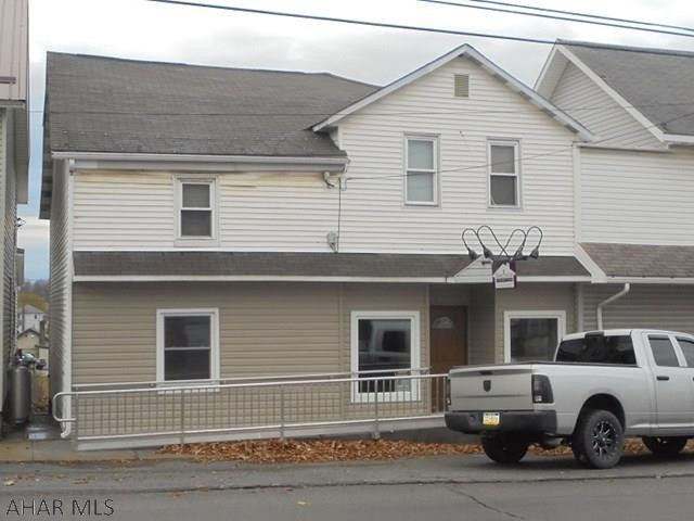 Nice remodeled 2 story commercial building and a 2nd floor 2 BR apartment with long term tenant. Rent is $582 mo- includes water & sewage.