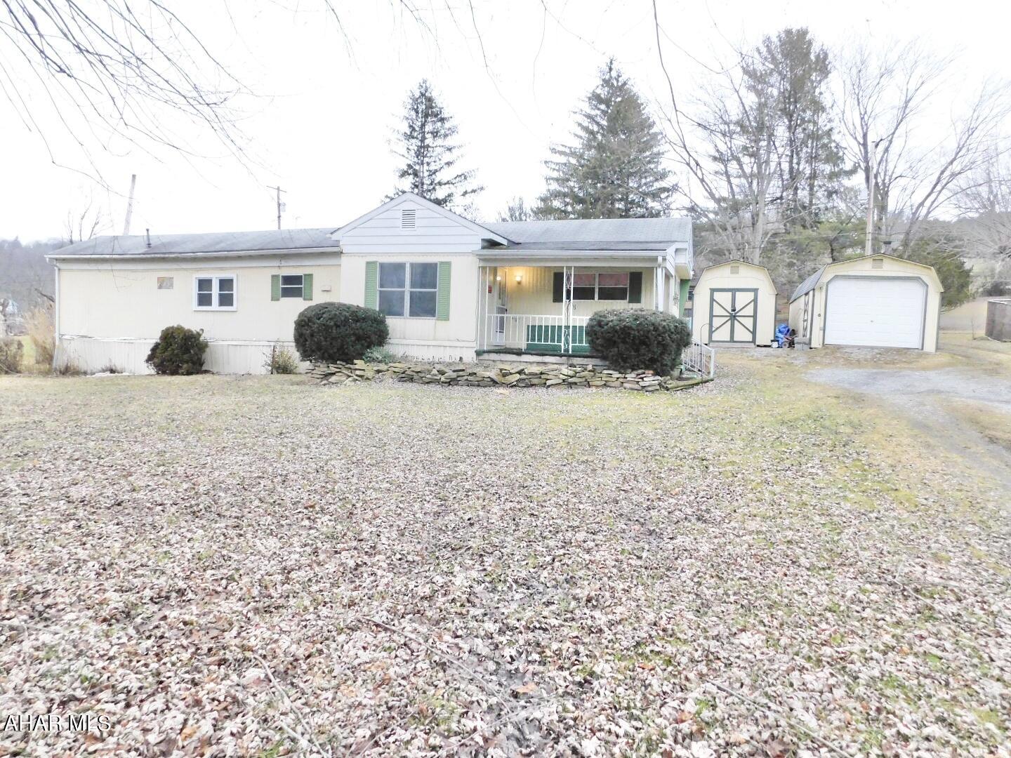 Great opportunity to begin your investment portfolio. Almost 1 acre of ground with partially remodeled trailer and additional sheds included. All utilities present and hooked up. Cash sale.