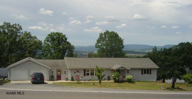 Spacious Ranch - Logan Twp - Altoona Schools.  3 BR, 1.5 bath, LR/wood FP, Kitchen/Dining Area, Laundry hookups in mud room and off FR.  Huge FR with ceramic tile floors.  Included: ceiling fans, blinds, Refreigerator, range, DW, Disposal, AG Pool, deck, pool table.  Raised strawberry patch & garden, peach trees, currant bushes, enclosed breezeway - 2 car garage on 1 acre.