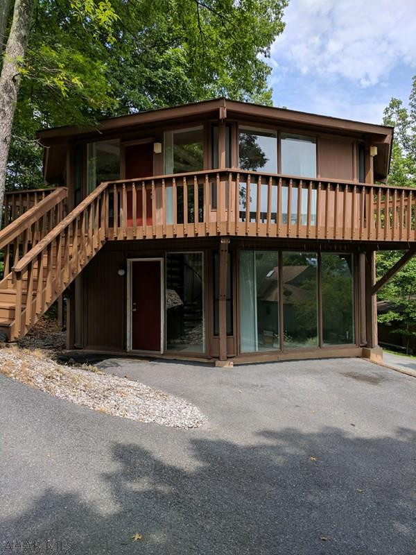 Welcome to your new getaway spot complete with a view of the Bedford Springs Golf Course!  This 2 bedroom, 2 bath home comes not only with a fantastic view, but also has central air, with an open kitchen in which all appliances are included!  Come out and experience this property for yourself!  Motivated sellers!