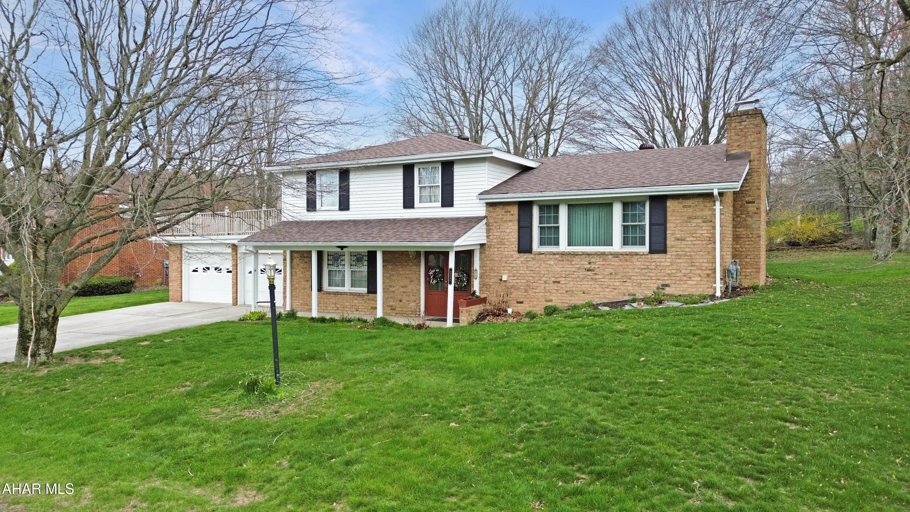 Welcome to 212 Maplebrook Road, nestled in the desirable Crestwood Estates of Ebensburg! This well-maintained multi-level home offers incredible potential and is ready for your personal touch. With a new roof installed in 2025, some of the big-ticket updates are already taken care of. Step inside to a welcoming main-level foyer that opens to a spacious living room featuring a cozy gas fireplace and stunning custom woodwork throughout. The next level offers a bright and functional layout with a large family room, formal dining area, and a fully equipped kitchen with included appliances. Upstairs, you'll find three generously sized bedrooms and a full bathroom, providing comfortable space for family or guests. The lower level adds even more versatility with an additional living area, a full bathroom with laundry, and ample storage and mechanical space. Outside, enjoy a 2-car attached garage, plenty of off-street parking, and a large yard ideal for relaxing or entertaining. The roof level deck provides a great space to unwind and take in the surroundings. With solid bones, tasteful features, and room to make it your own, this home is a fantastic opportunity in a great location. Schedule your showing today!