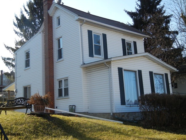 2 Story, kitchen, DR, LR, 1st floor laundry room. 1st floor 1/2 bath. Den with fireplace, finished basement, 2 large bedrooms, full bath on 2nd floor, attic storage, double lot. Off street parking, fenced yard, new gas furnace, new hot water tank, new carpet. New vinyl in kitchen, new vinyl in dining room, laundry room, and both bathrooms, new paint, new windows on 2nd floor, new down spouts, new electric fireplace, new faucets in kitchen & bath. Just Move In!