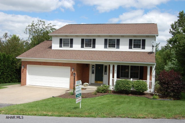 Gorgeous 4 Bedroom 3.5 Bath Brick Colonial situated in the heart of Penn Farms Estates.  Fully finished basement that includes a full bath, recreation room, office or storage room, and family room with wood stove. Walk-out onto patio and enjoy nature in a large private flat-backyard that sits along a beautiful wood line.  1st Floor includes Family room with fireplace that walks out onto a Deck, living room, dining room, kitchen, and 1/2 bath.  2nd Floor includes 4 bedrooms and 2 full baths with Full House Fan in second floor hallway along with a laundry chute for added convenience.