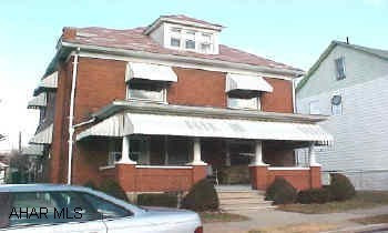 Nice four bedroom brick on a double lot.  Large rooms.  Semi-modern kitchen and formal dining room.  New roof installed last year.