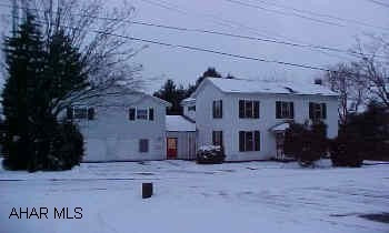 Two story home with addition that can be used as apts. Addition - 1560 sq. ft. 1unit 4 bed. 1 unit 4 bed. Property can be used as single family home or can be set up as apts. Lot size for home is .339 acre + 1.75 aces additional.