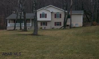 4 Levels To This Home Spacious & Lovely - 5 Bedrooms & 2.1/2 Baths - Multi-Level On 1.41 Acres - Owner Is A Builder - With Many Extras In This Home - 2 Fireplaces - Brick & Oak Bar - Office - Family Room - Game Room - Covered Deck - Shed - Lot's Of Brick & Oak Work