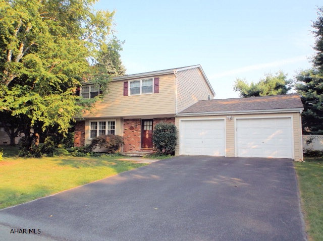 Beautifully remodeled two story with designer wall colors to please everyone.  Cherry kitchen with granite counter tops and ceramic tile floor.  Hardwood floors throughout. Formal dining room. Large living room with wood burning fireplace.  1st floor 1/2 bath. All bedrooms are spacious and will accommodate large furniture.  Finished basement with ceramic tile floor, wet bar, and new 3/4 bath. Extend Summer into Fall with the heated in ground pool. Covered patio, large yard with privacy fencing. This is a great home for entertaining both inside and outside.  Two car attached garage.  All this at an affordable price.  Act quickly!!