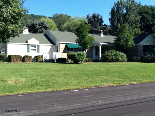 Exceptionally built large ranch! New roof, new carpets, new wiring, new gas logs in both fireplaces, new radon mitigations, too many other new items to list....Huge bedrooms, two oversized windows and beautiful gas fireplace grace the large formal living room. A separate dining room can be found off the large eat-in kitchen. Beautiful deck off kitchen makes entertaining a breeze. Two car garage plus carport and amazing finished basement make this home a rare find in this prime Meadowbrook location.