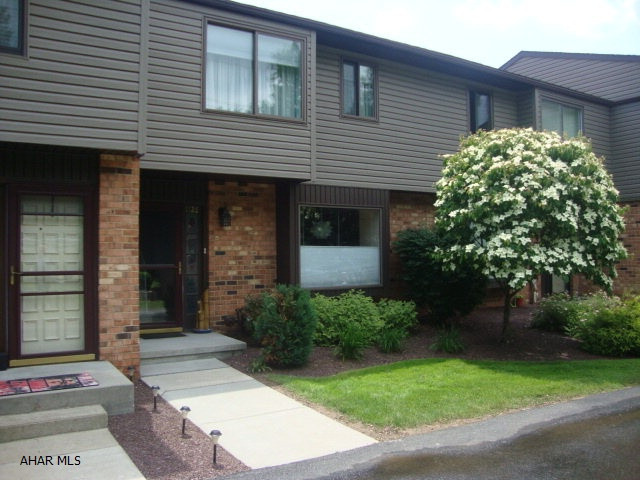 Enjoy the view and watch the wildlife from the private covered deck with an open extension of this 3 bedroom, 2 1/2 bath Hollidaysburg townhouse overlooking part of the Sylvan Hills golf course.  This quiet move-in ready home has been recently painted and features a large master with an on-suite bathroom, wood burning fireplace, and almost new central A/C unit and furnace.  The 18-unit complex has off street parking, and this charming unit has an integral one-car garage.
