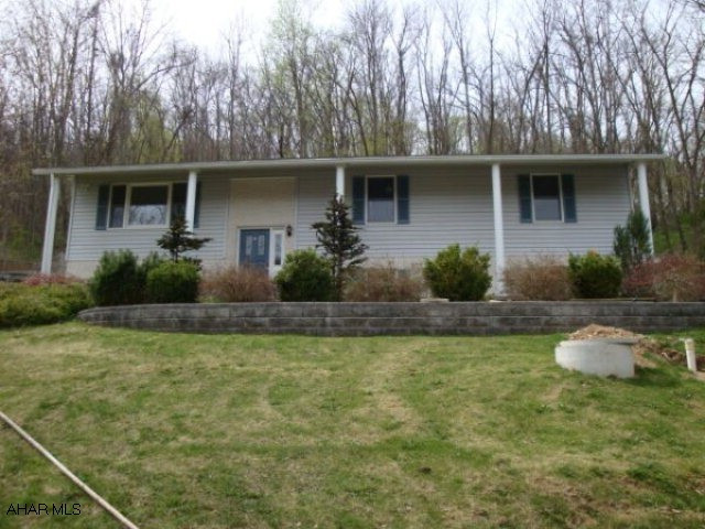 Property is being sold as is  Septic is holding tank. Foreclosure. Beautiful views of the golf course.  A little TLC would make this a great house! 4 BR, 2.75 BA, finished basement, oak kitchen.
