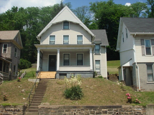 Very nice 3 bedroom, 1 bath home with high ceilings, tall (floor to ceiling) windows, eat-in kitchen, enclosed back porch and covered front porch.  Some of the rooms have beautiful natural woodwork.  The full unfinished basement could be a nice storage area.  A great starter home or a very nice investment property. There is a cement pad on a foundation at the end of the back yard where a one car garage used to be.  Listing agent is related to the sellers.