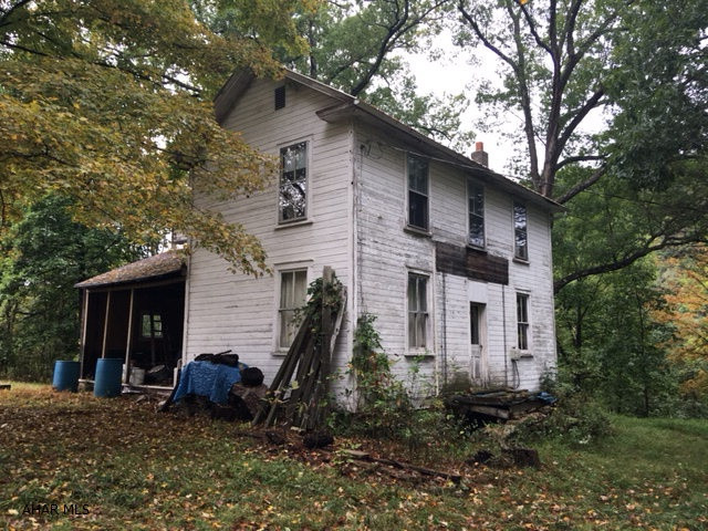 Very nice, secluded setting and on 10 acres. Adjacent to State Game lands. Quick access to Broad Top Rails to Trails and near Raystown Lake. Limited info as owner acquired through an estate. Frame 13'x13' shed. Barn 47'x20'. Needs much TLC.