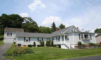 Delightful-super maintenance and thoroughly updated for maximum heating and cooling efficiency. Replaced all 42 windows, vinyl siding and porch railing, roof and spouting. Ceiling and walls blown in insulation. Size of property increased to 2.73 acres, barn and garage included.