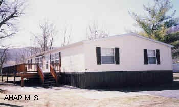 Redmond Shawdow Ridge doublewide, 28' x 52' with bonus features. Large deck, facing the Juniata River, Central air, tilt windows, all appliances.