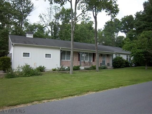 3 BR, 2.5 BA ranch with 2 car garage and work shop. Enclosed private rear patio with propane grill. All appliances stay. Taxes and room measurements to be verified by buyer.  Fireplace is either a wood burner or propane.  Family room is very spacious and rustic.  Barn wood walls accented by one stone wall with fireplace.