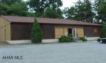 One story frame structure storefront - plenty of parking.  Was Jarret Music Store.