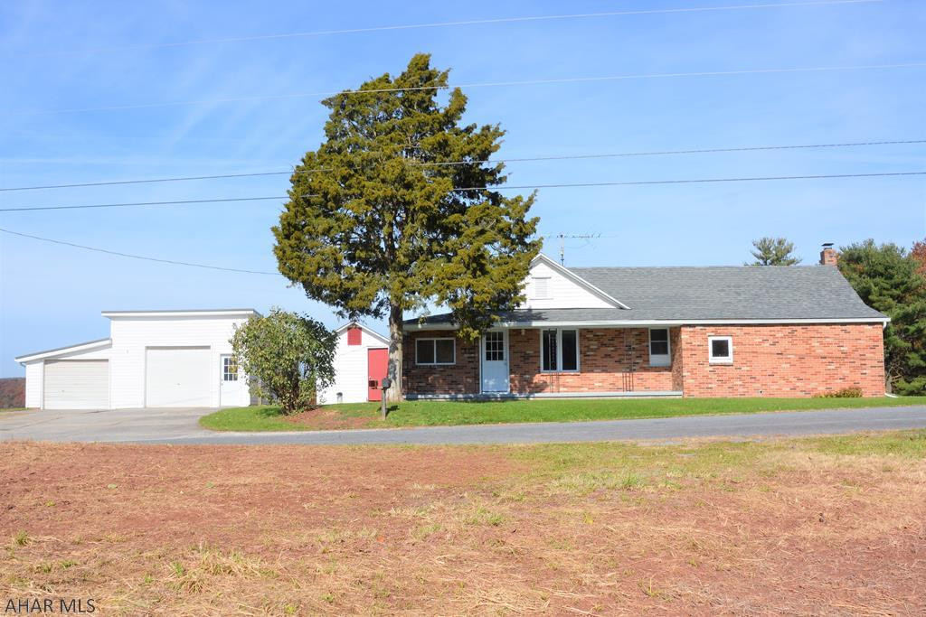 Recently remodeled 3 bedroom, 1 bath home with large detached garage. This home is move in ready and has all the conveniences of one story living completed with a large yard and beautiful views. Recent updates include oil furnace, windows, flooring, kitchen cabinets, and much more! **Motivated Seller**