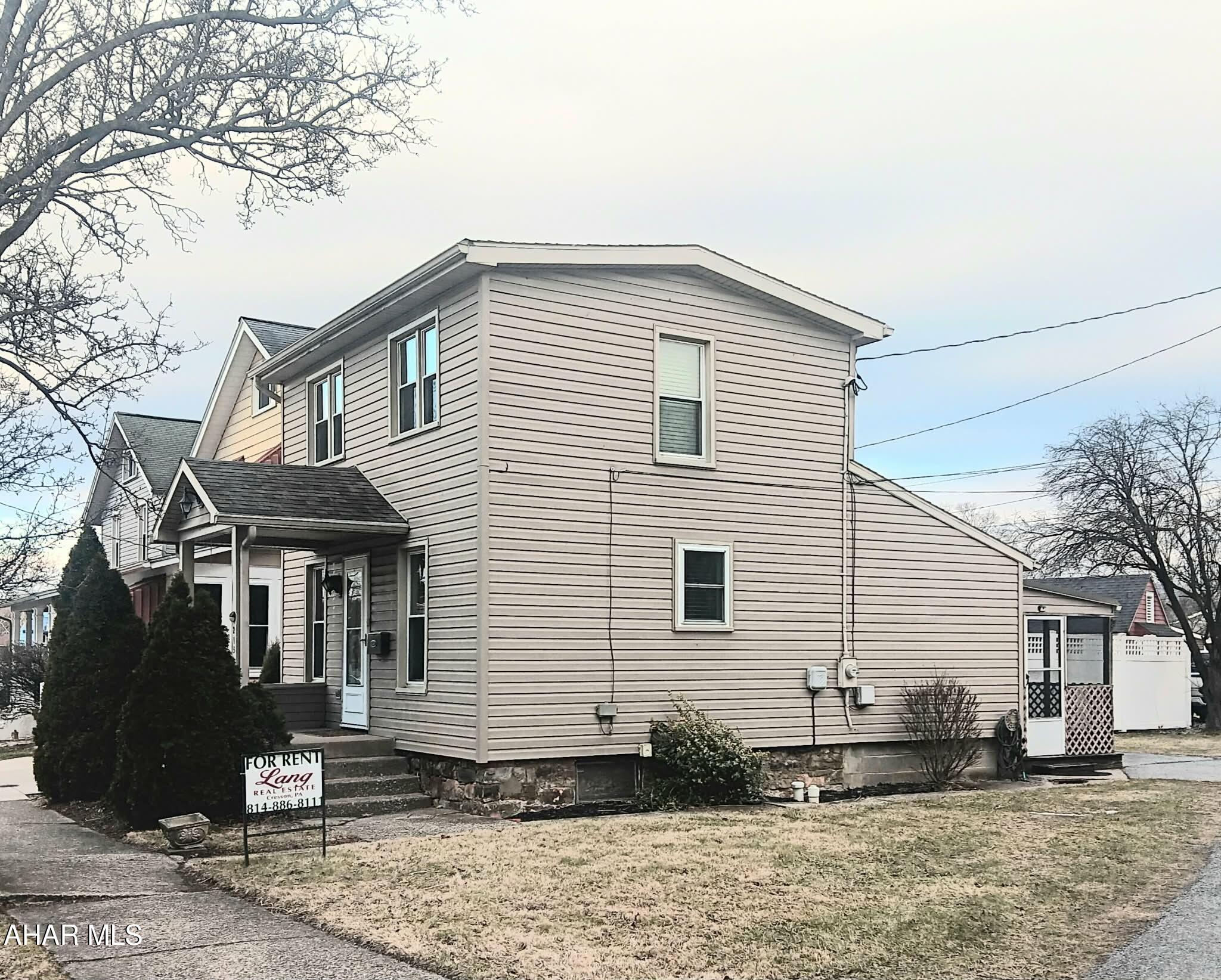 Take in this classic yet modern 1-bedroom, 1-bath home for rent in Hollidaysburg Borough, just minutes from historic downtown. This beautifully maintained residence blends timeless character with thoughtful modern updates at an exceptionally competitive price point. Inside, you'll find hardwood floors throughout, a remodeled full bathroom, and a bright, inviting layout. The screened-in porch offers the perfect space for relaxing or entertaining, while the large basement provides an impressive amount of storage. An excellent opportunity to enjoy comfort, style, and location without compromise. Contact Lang Real Estate to obtain a rental application and No Pets.