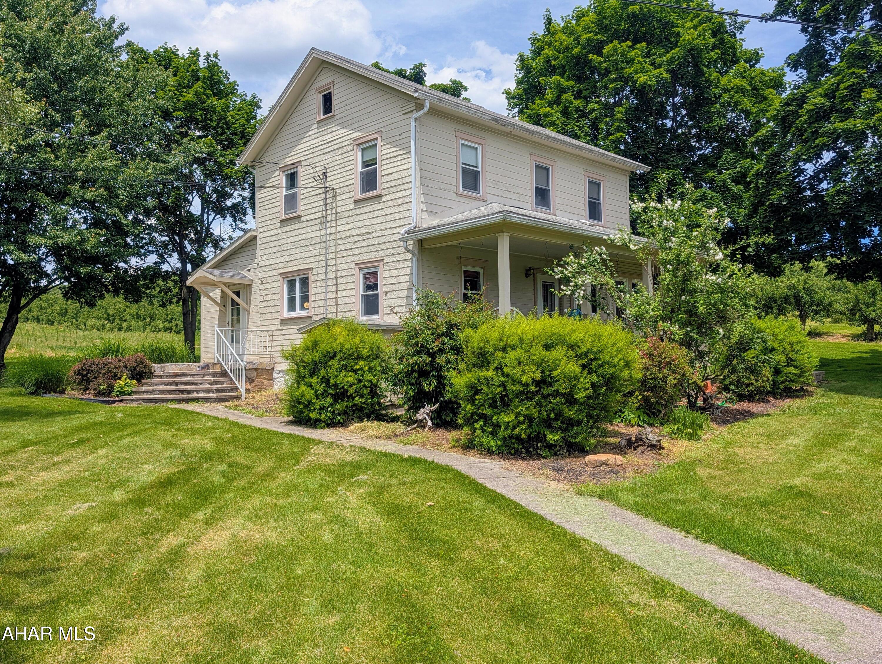 Welcome home to this charming 1890 farmhouse nestled in the serene countryside of Schellsburg, PA. This is a piece of history with the delightfully quaint two-story, 2-bedroom, 1.5-bath residence that radiates rustic warmth and timeless elegance.  Tucked away and hidden amongst the beauty of rural farmland. 

 Set against a breathtaking backdrop of approximately 181.165 acres of premium agricultural acreage, this property is a rare find for those seeking privacy and pursuing their farming dreams. Imagine endless possibilities amidst rolling fields perfect for crops, livestock, or simply enjoying nature's beauty.

The estate boasts numerous outbuildings including barns and sheds ideal for storage or creative projects, alongside a garage or workshop ready to support all your creative endeavors. There are 3 wells located on the property.  Whether you are an aspiring homesteader, farmer, or simply desire a personal sanctuary away from city bustle--this property holds unmatched potential.

Soak in the breathtaking views this property has to offer or entertain under starlit skies in expansive outdoor spaces tailored for gatherings with family and friends. This idyllic farm is a rare opportunity.  Schedule your personal tour!