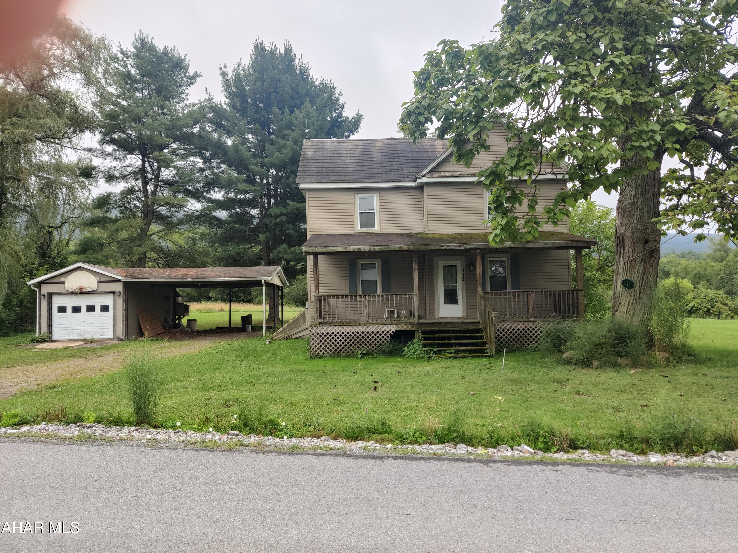 RENT TO OWN with $10K Down or Outright Sale. What a Beautiful Spot for this 3 BR 1.5 Bath Home with Garage in Hollidaysburg. No Close Neighbors except the Horses. Great Flat and Functional 1 Acre Lot. Wood Stove in Living Room. House needs a lot of work, but so much potential. Low Taxes.