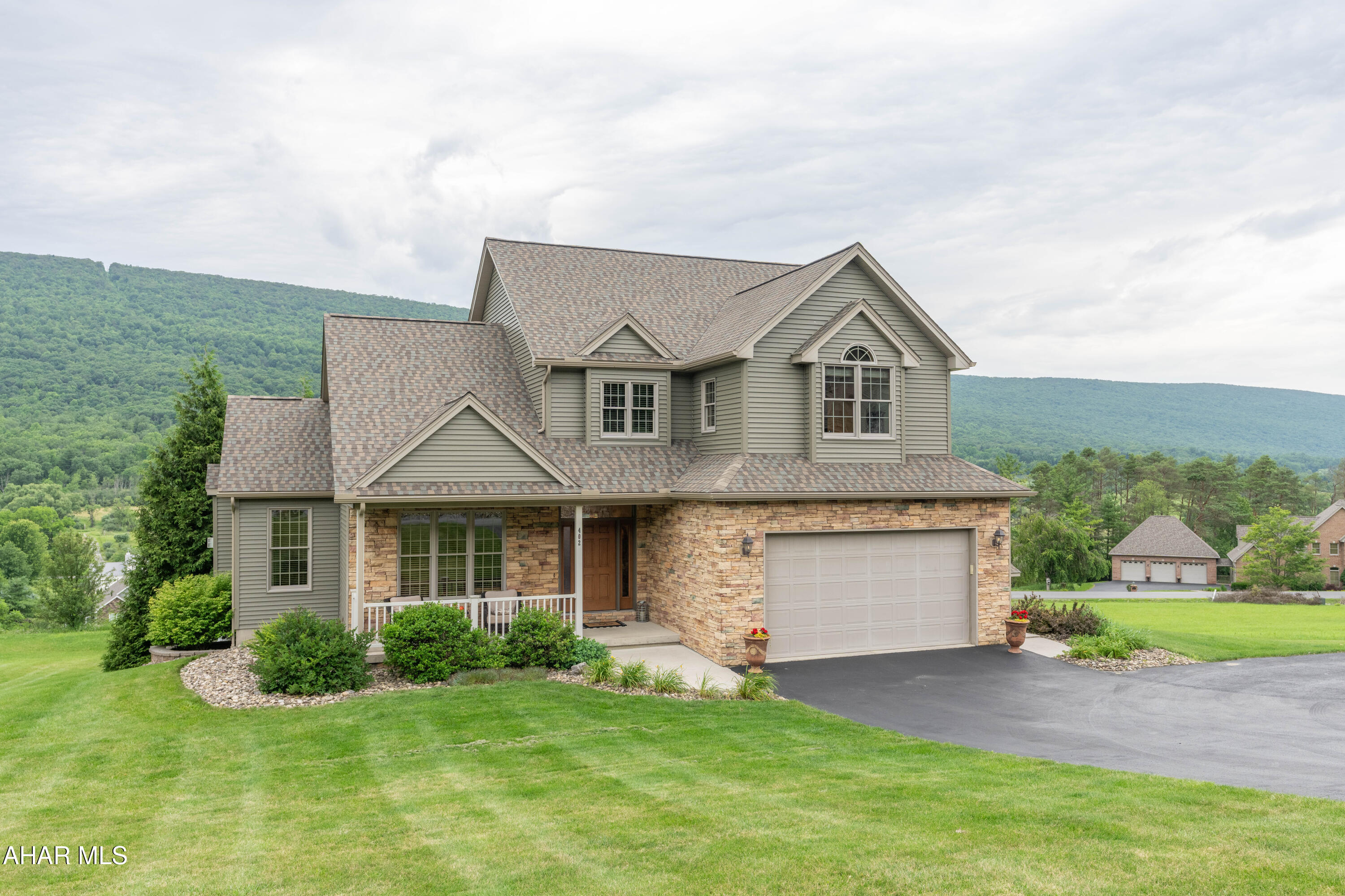 Located in beautiful Scotch Valley, this 4-bedroom 3.5 bath home has been immaculately maintained. Step inside and you will be greeted by an open floor plan with oversized windows for natural light.  Throughout this home you will find oak trim, doors, and cabinetry.  The pristine eat in kitchen offers access to rear deck perfect for any size crowd.  Situated on half an acre lot you can sit on the rear deck and enjoy views of the valley. The full finished basement with wet bar has endless potential.  A home like this will not last!  Schedule your private showing!
