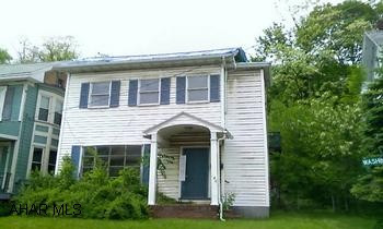 Nice duplex large rooms, hardwood floors on 1st floor. Sold "AS IS"