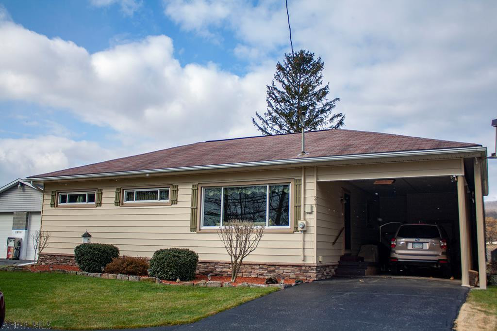 This is an immaculate ranch style home in the Bellwood-Antis School District.  This home has countless updates and features, making it a MUST SEE home!!  3 bedrooms and 1 full bath on the main level.  The living room has abundant natural light from the picture window.  The eat-in kitchen is updated and features included appliances.  There is a sunroom off the kitchen perfect for any season with views of the rolling landscape!  Adjacent patio has composite flooring and is a perfect place to grill or entertain guests.  The backyard has fruit trees and a shed with metal roof.  The home has a full basement with laundry area and included washer and dryer.  There is a carport and turnaround section off the main driveway.  The home even has a generator and central air!