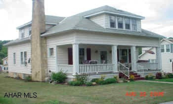 Very spacious cape cod with hardwood floors and new carpet. Finished basement, storage dormers, detatched two car garage, and a large level lot make this home a must see.