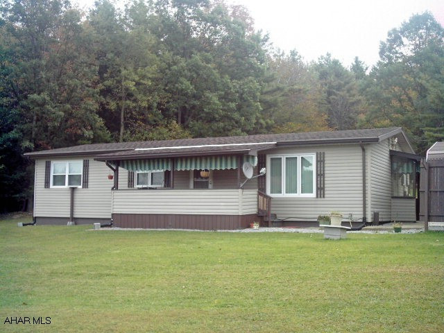 This lovely 2 acre lot is secluded and peaceful with a modular home that is extremely energy efficient--propane insta heat HWH, triple pane windows, and a high efficiency furnace--perfect location for getting away from it all--Priced To Sell!!