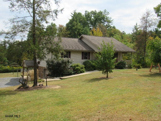 Well built,meticulously maintained Vinyl&Stone 3BR, 2.5BA Ranch home w/its Superior Walls,Andersen Windows,& Geo-Thermal heating/AC system is on 3.08 acres,located in Todd,PA & within 15 min. to Lake Raystown Resort & 18 min. to Trough Creek State Park.A newly upgraded kitchen with island & Eat-In Kit area,cathedral white pine tongue & groove ceiling in Living Room and Kitchen, & Laundry on 1st Flr. The lower level has a Hair Salon but could easily be converted to a family room.There is plenty of storage in the lower level with an additional 15'6x 14'6 room & another 15'6' x 12' room that could be converted to a 4th bedroom.This property also has a 8x22 covered front porch,fenced in yard,a 12x20 Shed,16x20 Garage, & a 3 tier partial composite deck.Once you see this home, Start Packing!