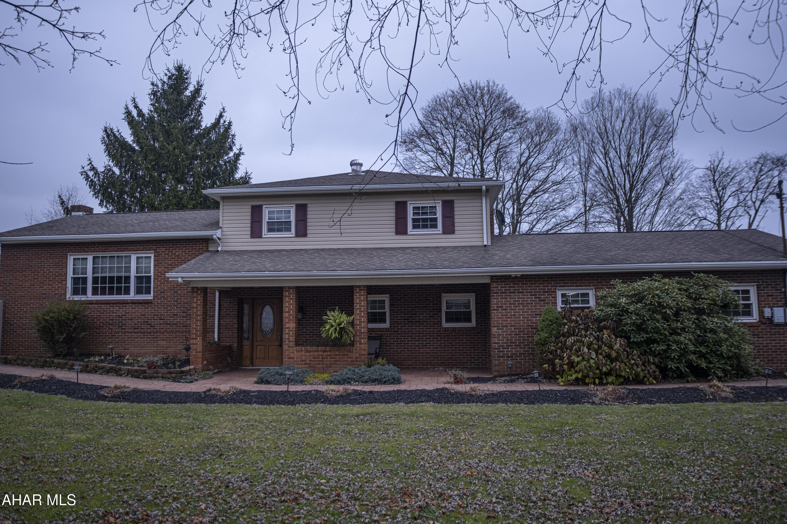Located in Ebensburg's sought-after Central Cambria School District, this charming tri-level, 3-bedroom, 3-bath home sits on a spacious 0.63-acre lot, offering plenty of outdoor space. Inside, the updated kitchen boasts sleek Fineline cabinets, new appliances, and a seamless flow to an expansive patio, perfect for entertaining. Hardwood floors span throughout the home, complemented by a spacious foyer with a stylish barn door closet. Relax by the re-stoned gas fireplace or enjoy year-round comfort with a 4-zoned gas hot water furnace replaced last year. The large master suite features an ensuite with a Bathfitter shower. A main floor office space off the garage includes a laundry area and half bath for added convenience. New garage doors enhance the oversized 2-car garage, offering plenty of storage. Trash pick-up is included with taxes, making this meticulously maintained home even more appealing. Schedule your showing today!