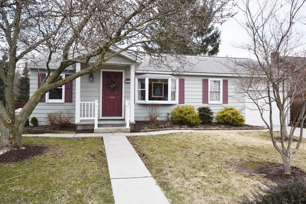 A rare find in Hollidaysburg Borough.  This move-in ready ranch style home has a beautifully remodeled and spacious kitchen with ceramic tile flooring, nice appliances, and cute breakfast area.  The dining room is bright with lots of natural light.  The den would make a perfect office, computer room, or extra TV room.  The bathroom is currently handicap accessible with safety bars, seat, and handle shower head.  Master bedroom has a walk-in closet with an additional cedar closet.   Head out to the three season sun room with your morning coffee!  Additional features include hardwood floors, central air, attached shed, and pond with waterfall in yard.