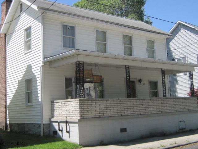 Two story, containing living room, dining area, kitchen, three bedrooms and one bath. Front and rear covered porch. Oil hot air heat with Energy Mate in full basement. Good town location with city water and sewer. Near Elementary and Middle Senior High school. Stores, bank and Post Office one block away. Completion of second floor bath is necessary. Double glazed windows, 100 amp electric service.