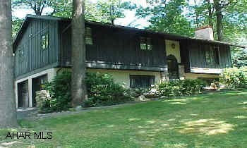Move right in! Large wooded lot with nice 18x36 inground pool.  Bi-level home in the Bellemeade Estates. Three BR, fireplace, and lower level family room.