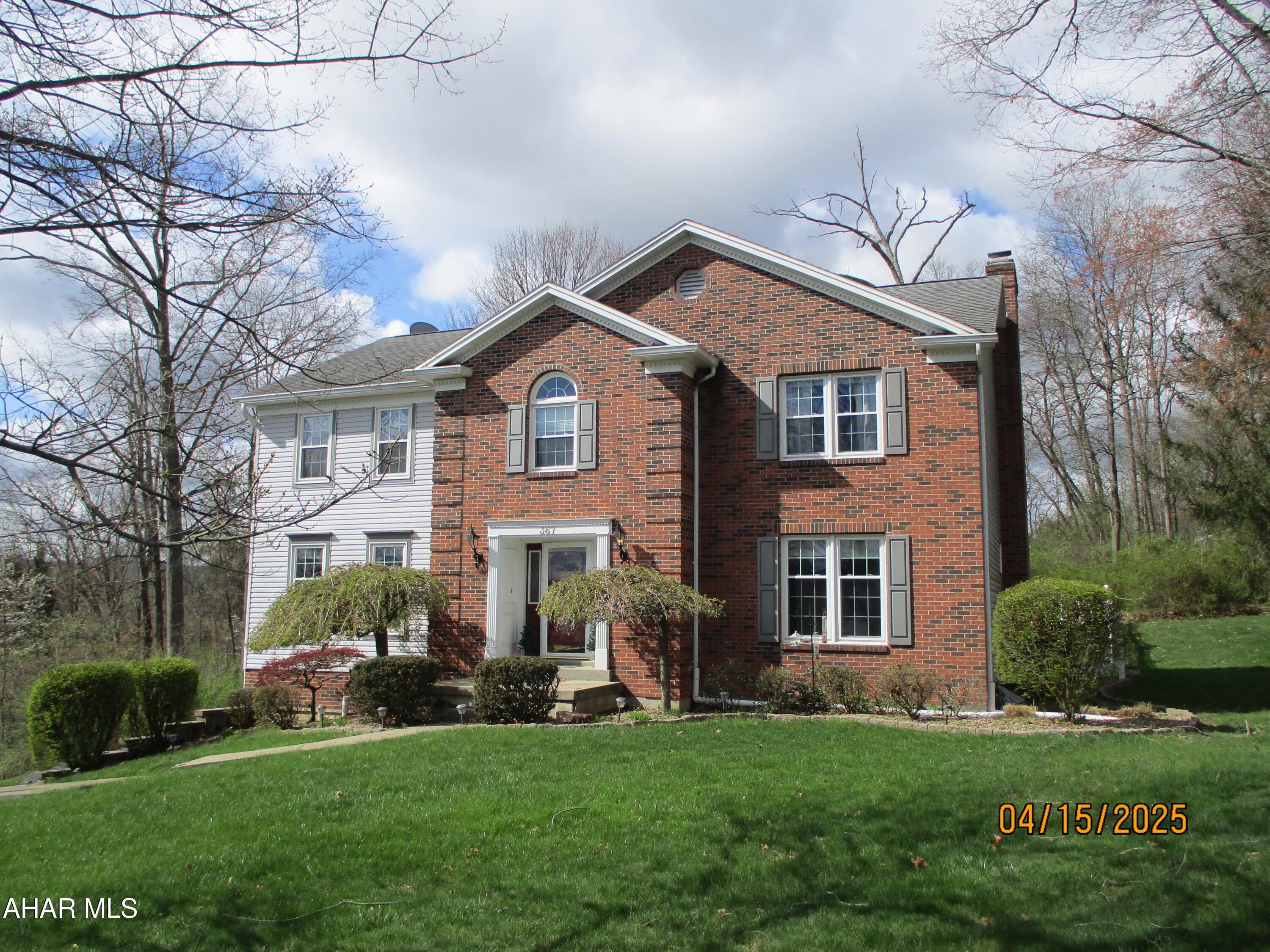This lovely 4 bedroom is located in Elmwood. Sitting on a large secluded lot that is landscaped with fenced in backyard, enjoy the woods from your 3 season room.  When you walk in the front door you will feel the space and warmth .....making this a wonderful family home. The kitchen is open to the family room with fireplace and steps out to the 3 season room.  Come take a look....this home will go fast!
