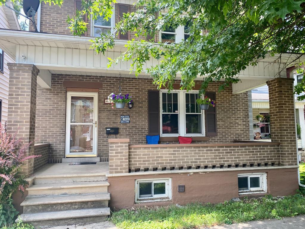 Enjoy the convenience of living in uptown Huntingdon in this 3 story 4 BR, 1 BA brick home, close college, hospital, schools, grocery store, and downtown area.  This home features spacious rooms and a desirable layout with a welcoming foyer, living, dining, den/office, kitchen, and an area for a 1/2 bath and potential laundry on the first floor. You'll enjoy the screened porch that overlooks the fenced in yard and the two-car carport that provides ample off-street parking.  The upstairs includes three bedrooms, a full bath and the third floor is a bonus room that can be a bedroom, game room, play room, whatever suits your needs.  This home portrays a lot of character with the original hardwood flooring and woodwork. There is a pellet stove to provide an additional heat source.