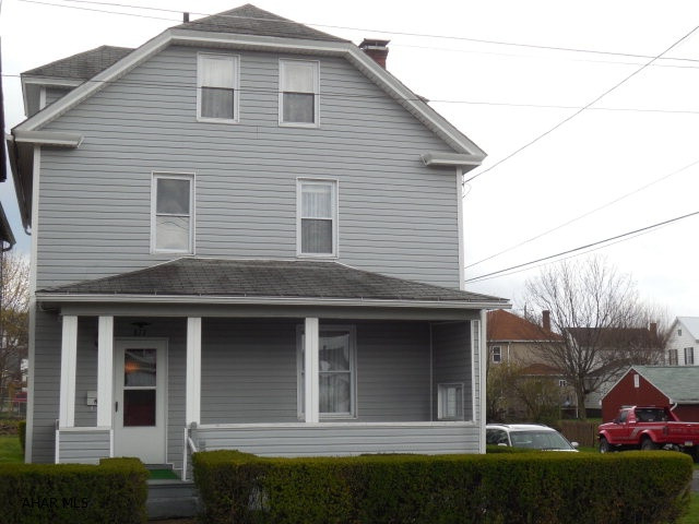This traditional early 20th century home has an airy floor plan. It's room feature high ceilings and great natural light. The lot is level and and on a corner and can accommodate off street parking for 5 to 6 cars. A lovely staircase and wider moldings enhance this freshly painted immaculate home.