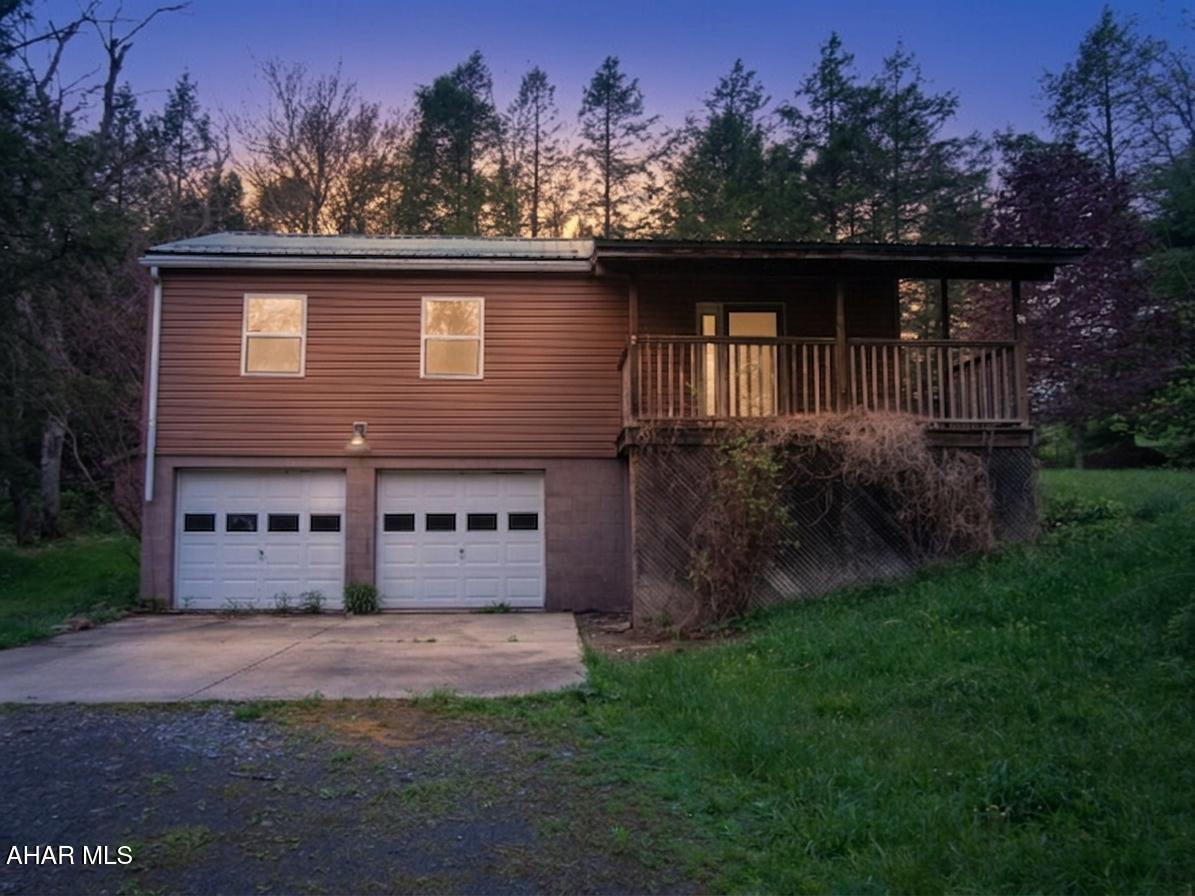 Looking for some privacy in Ebensburg? Check out this one story home with lots of storage, including an integral two car garage and detached two car garage, large deck perfect for summer evenings, part of the structure is a manufactured home, This property eligible under Freddie Mac First Look Initiative through 7/4/2026. Seller will only respond to owner occupant offers in this timeframe. Freddie Mac will not respond to investor offers during the First Look period.Buyer must pay 2% transfer tax.