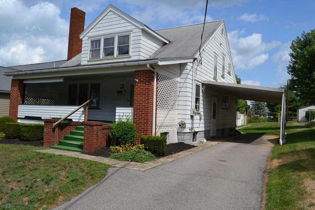 What an amazing side of town! What a huge house! Could be four very large bedrooms, 3 with walk in closets. Wood burning brick accent fireplace and lots of large windows for natural light. First floor bedroom and full bath! Listing agent has experience and is offering free information with diy/design walk through to those interested in seeing the full potential this home has. Hardwood floors are suspected to be under all carpets. Don't let a little fixer-upper scare you away! Come take a look!