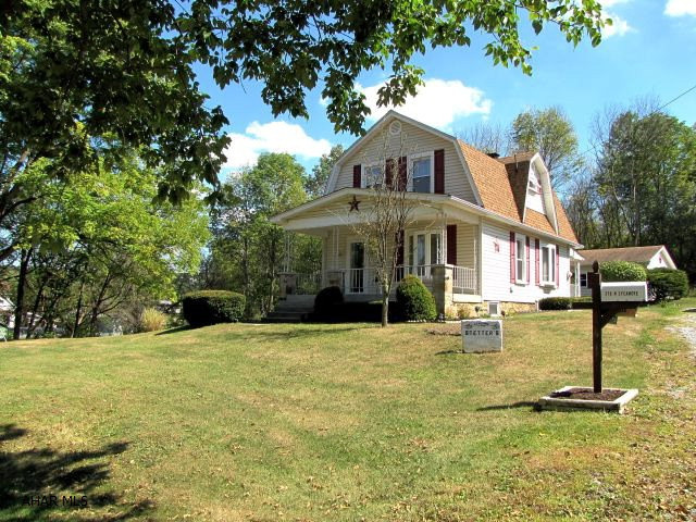 GREAT location on a dead end street. Borders woods and also borders Kettle Creek. Well maintained home. All new carpeting, neutral colors, remodeled bath, oak kitchen. Could be 3 bedrooms, 3rd bedroom is small and would make a nice office or walk-in closet. 2 Car garage, shed.