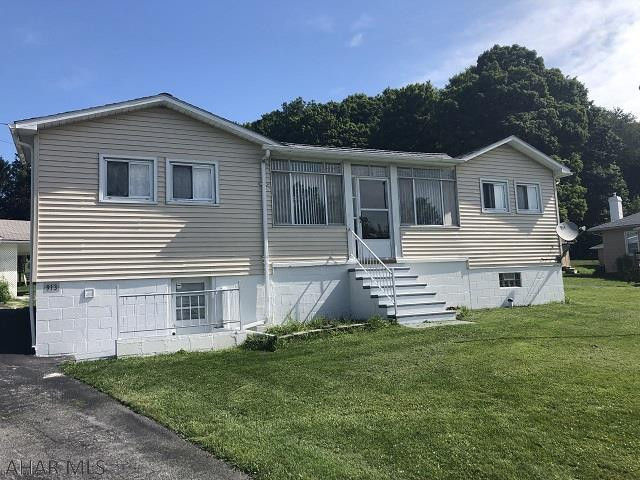 2 BR vinyl sided ranch in Forest Hills school district on a little over  ac lot. Large updated eat-in kitchen.  2 car detached garage. $82,900
