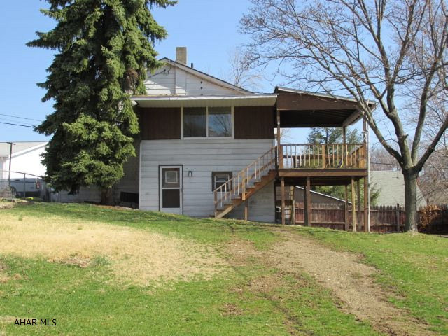 Cute 2 bedroom, 1 bath on large lot, covered deck, security system, central air, integral garage, new shingle roof just installed.