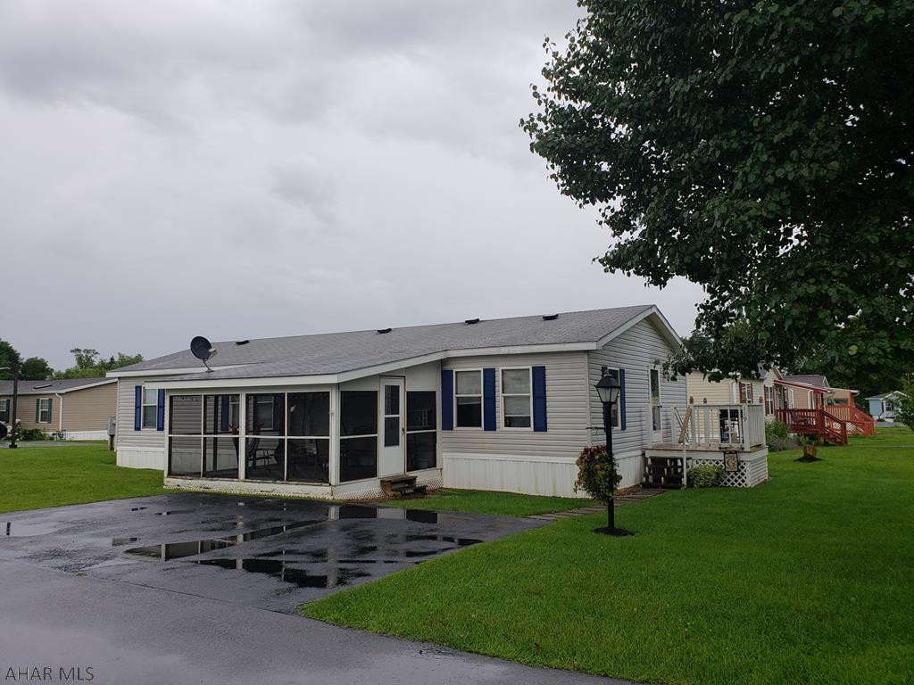 Well maintained 3 bedroom 2 bath doublewide at Independence Place. This home features an open floor plan and living room with vaulted ceiling. The kitchen has a nice breakfast bar and eat in area. The master bedroom has a walk in closet and full bath with a garden tub. The screened porch is perfect for quiet evenings. For extra storage there is a 14x10 shed included with this home. Lot rent includes trash and snow removal. Water and sewer is billed by association.  Call listing agent for your private tour!