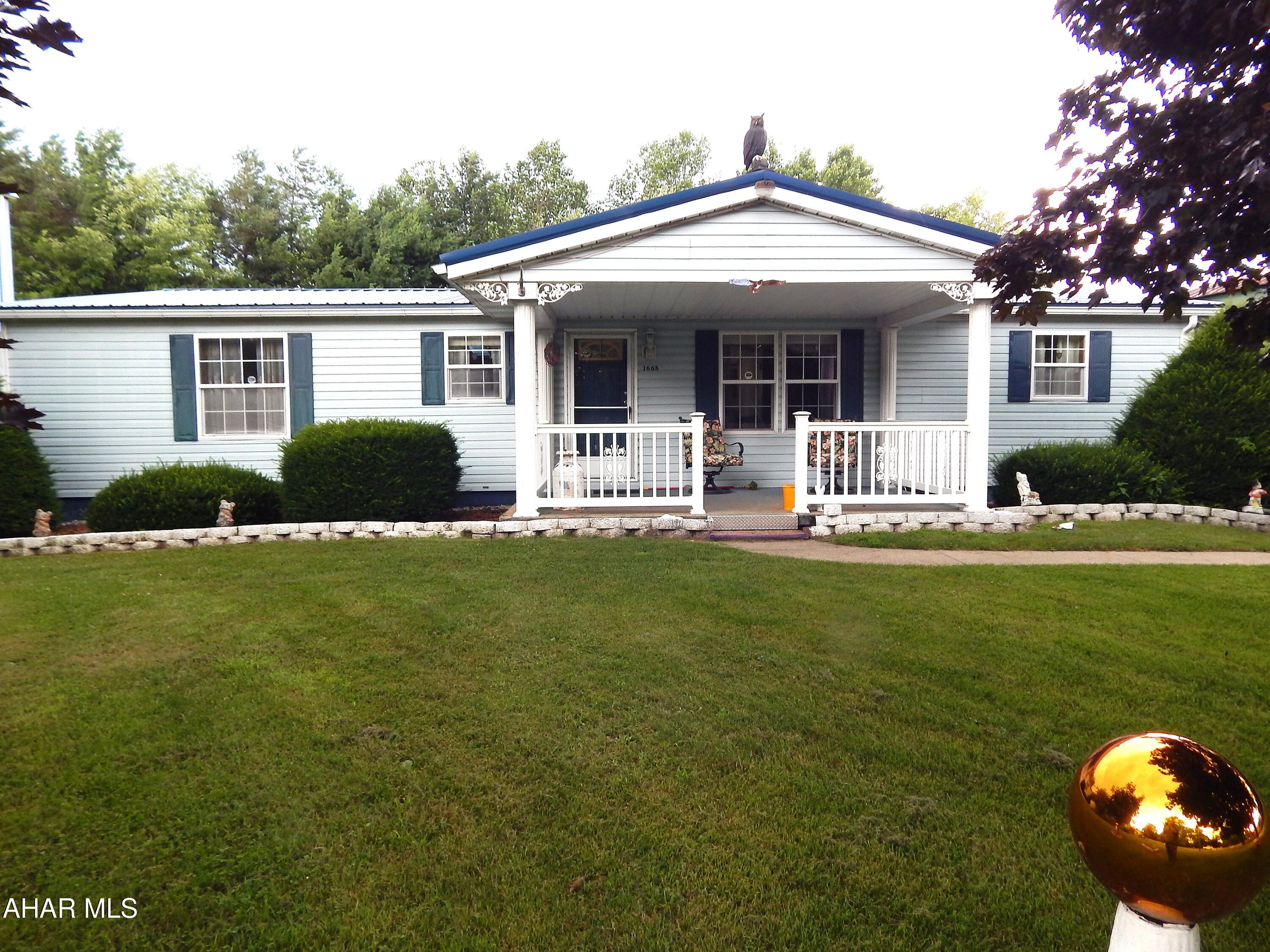 You are invited to view this charming one-story home, which features single-floor living with three restful bedrooms and two bathrooms, including a master bedroom. It also boasts a beautiful, spacious kitchen. This property is permanently set on a block foundation with a crawl space basement.

Enjoy plenty of off-road parking with the long paved driveway leading up to an attached two-bay garage. An additional carport and an outdoor shed provide ample extra parking and storage space. Homebuyers will appreciate the large yard, perfect for entertaining friends or family.
This house would make an excellent starter home for first-time home buyers, a comfortable retirement home, or a promising rental investment.
Priced for a quick sale, this home won't last long. Please contact the listing agent for further details or to schedule your private tour today.