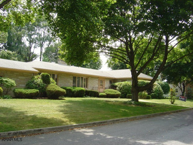 One of a kind Stone Ranch on level 185 X 120 lot.  Hardwood floors, 3 fireplaces, formal DR, LR, Family Room, 4 bedrooms & Laundry Room on first floor!!
