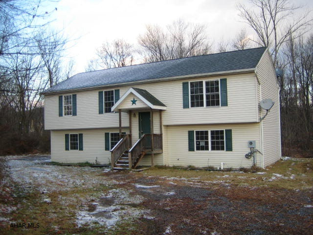 Nice vinyl Bi-Level in need to some TLC. Oak kitchen, large formal living room and dining area. Master suite with walk in closet and bath, finished basement with family room, den, spare bedroom and extra bath. Large, level lot and wood deck to rear. Property sold AS-IS. Seller will make no repairs. Buyer pays both transfer taxes. Equal Housing Opportunity.
