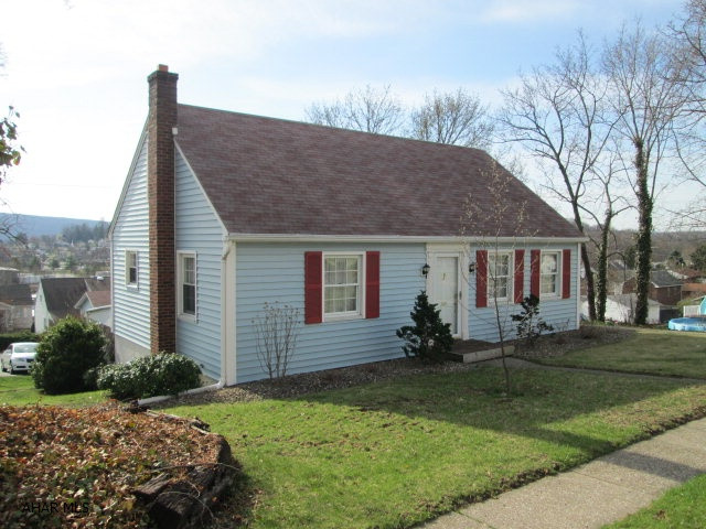 Immaculate Cape Cod featuring hardwood floors under carpet. Many upgrades throughout, vinyl sided, newer windows & furnace with C/A. Large detached garage with ample parking. Full basement waiting to be finished with walkout to patio.