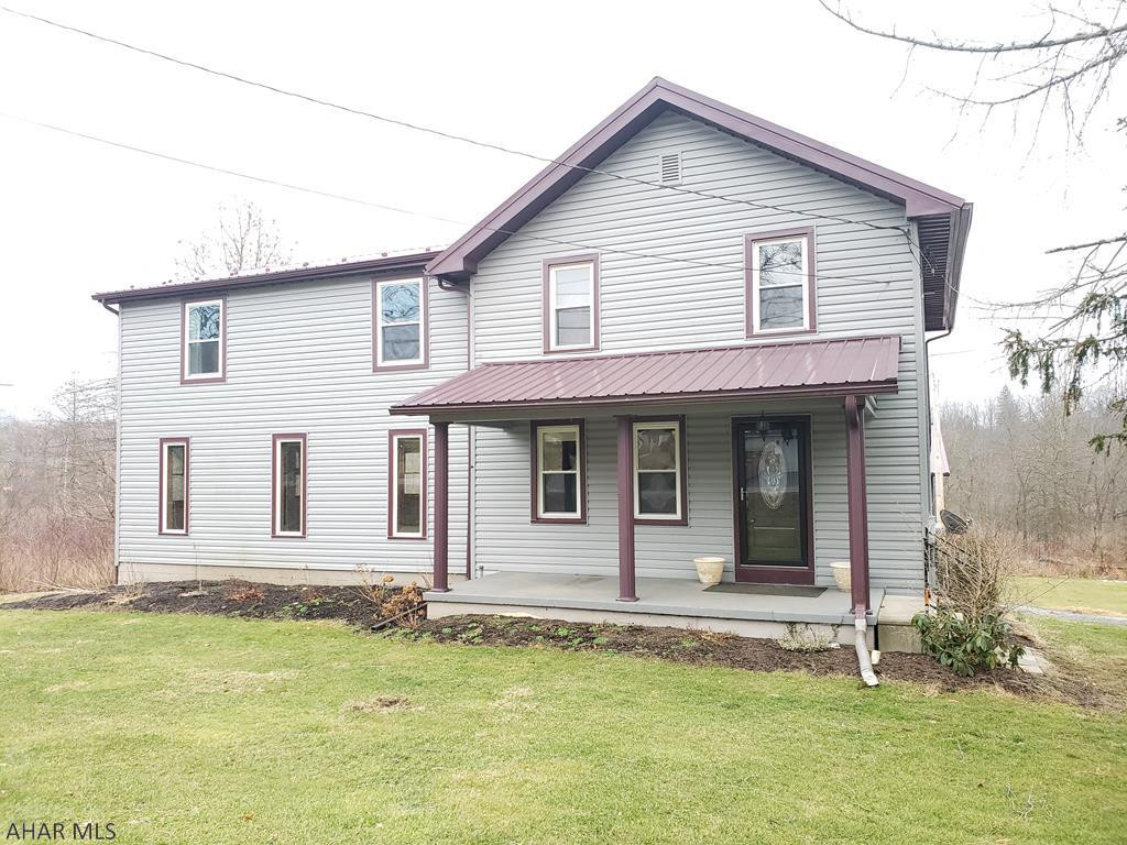 Sprawling 4 bedroom home located in Hollidaysburg!  This home has all of the space you could need and more!  Sitting on .5 Acres, the first floor features a living room, dining room, kitchen with Granite counter tops, and a  25' x 23' great room with gas fireplace.  Upstairs features a 3/4 Bath, 3 bedrooms, a master suite, and convenient 2nd floor laundry.  To round out the space, there is another 25' x 23' family room that walks out onto a screened in sun porch!  The  heated garage has 3 bays with one being a 14' overhead door to accommodate all of your "toys." Don't miss your chance to see this Home!
